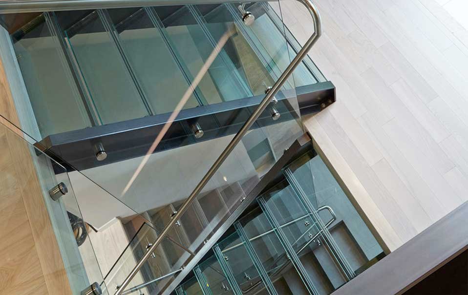 At Vitro, we utilize the finest glazing and architectural metal design and installation techniques for glass railing systems. Often defining the design of a building, our standards for workmanship bring to life even the most intricate glass railing systems.