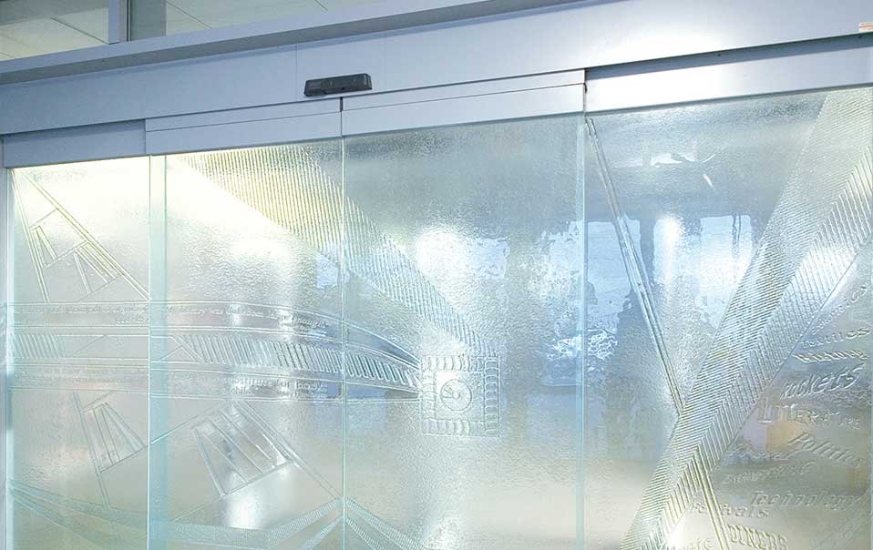 We can supply and fit all types of glass incorporating any of our standard sandblasted designs or to your own designs.We can incorporate sandblasted designs onto a variety of glasses as a visual safety aid to protect against accidents, in both commercial and residential applications.Sandblasted glasses can be treated with a surface protection agent, which protects the sandblasted surface from discolouration and minimises the effects of pollution and air impurities.